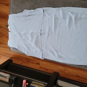 Baby blue dress free witj any purchase has a small makeup stain in third pic